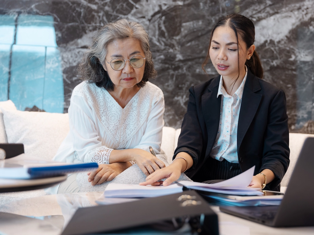 Senior couple meeting financial advisor for consultation