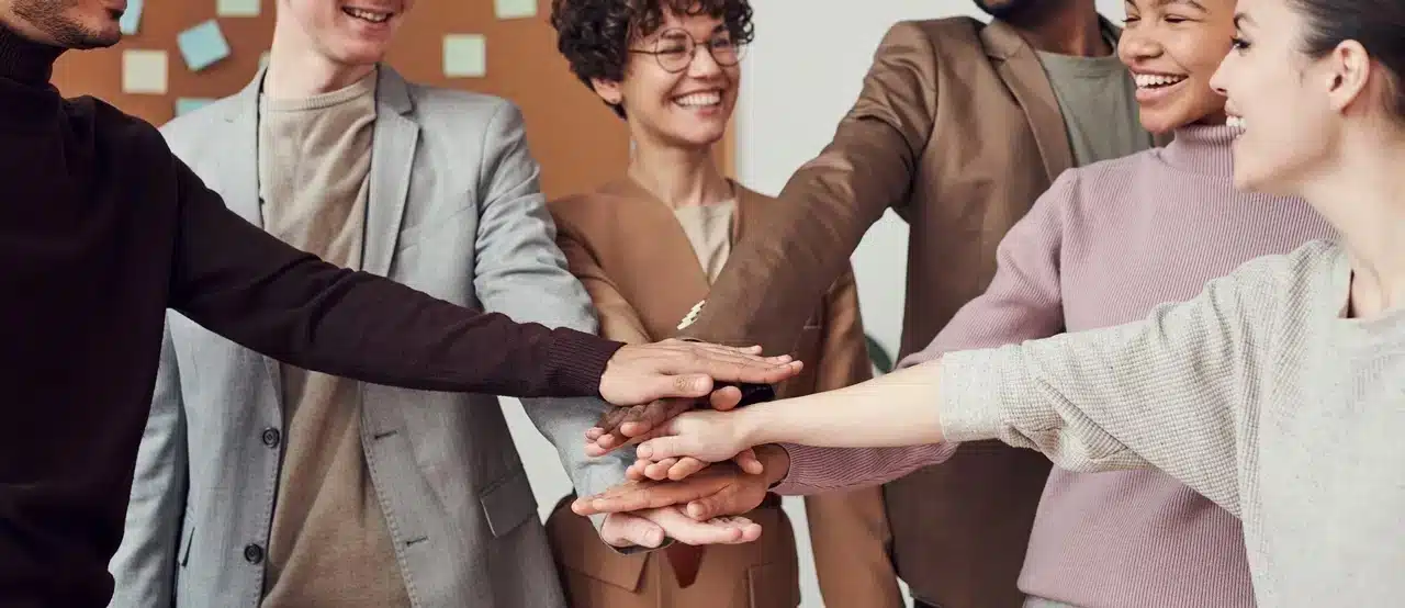 People doing a team hand shake