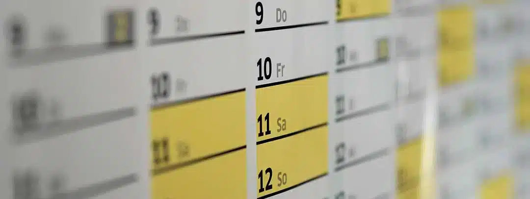 A photo of a calendar with dates highlighted in bright yellow. A Recognition of Foreign Divorce in the Philippines can take about 1 and a half years to conclude