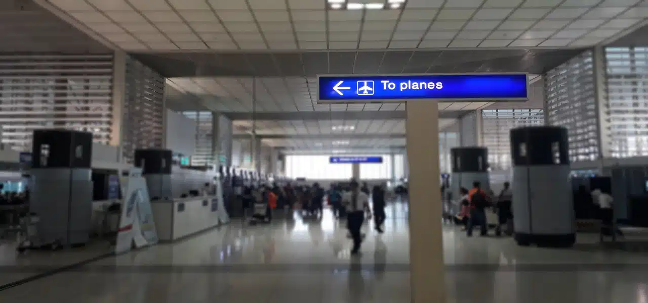 Inside an airport hallway leading to the departure