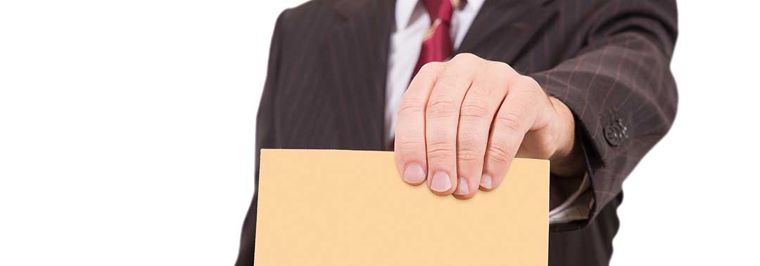 An employee handing in a resignation letter
