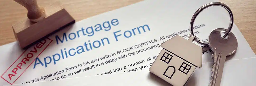 Picture of mortgage application approved with key 