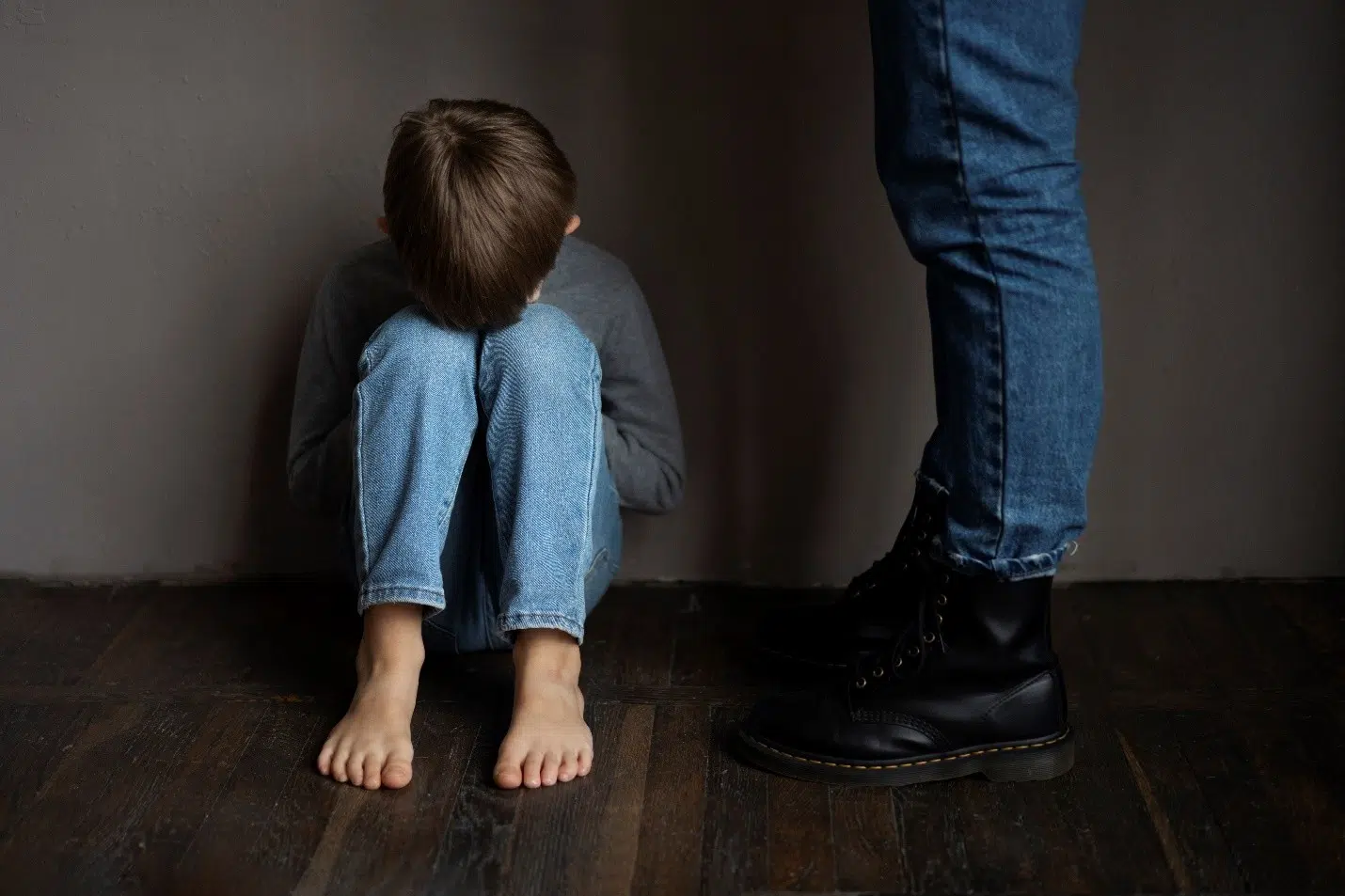 Parental Kidnapping in the Philippines child crying with someone standing beside him 4