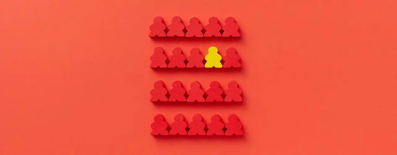 Limited Liability Company Philippines &ndash; one yellow wood block amongst red blocks symbolizing how Philippine LLC taxation is different.