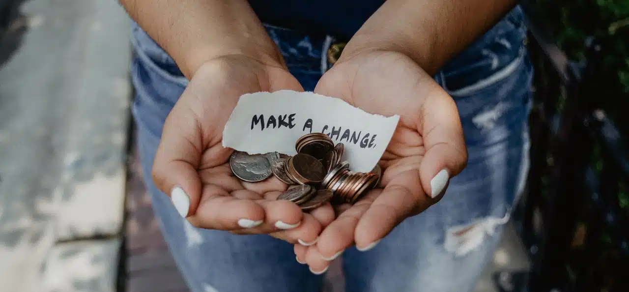 Hands with coins