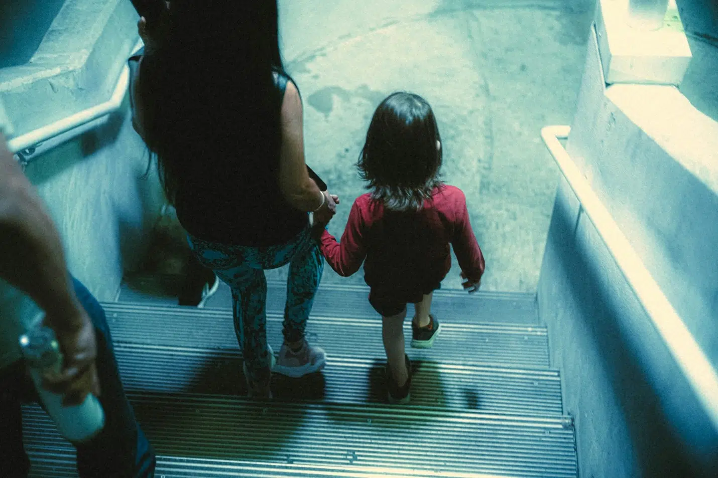 Parental Kidnapping in the Philippines mother and child on stair 3